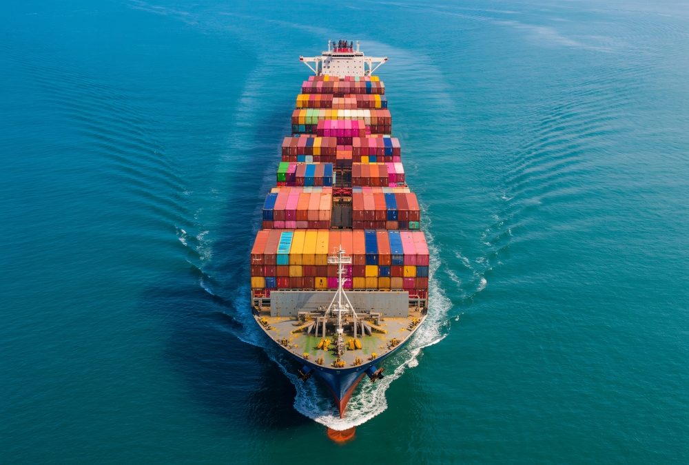 A,Container,Ship,Is,Sailing,On,The,Water,,Carrying,Many